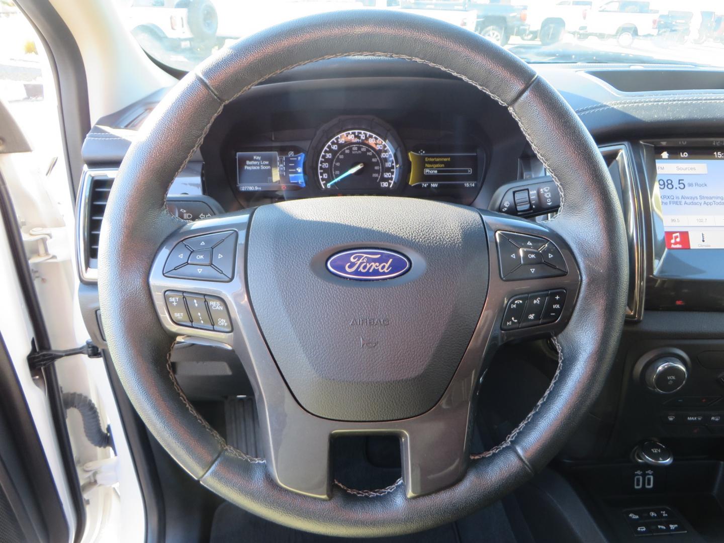 2019 White /Black Ford Ranger Lariat (1FTER4FHXKL) with an 2.3L engine, automatic transmission, located at 2630 Grass Valley Highway, Auburn, CA, 95603, (530) 508-5100, 38.937893, -121.095482 - Features a Fabtech suspension system, Fuel Offroad wheels, Nitto Ridge Grappler tires, Westin Running boards, and a Bakflip. - Photo#26